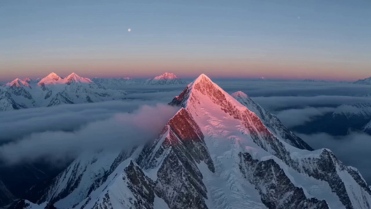 Extreme Wingsuit Flight over Snow Mountains