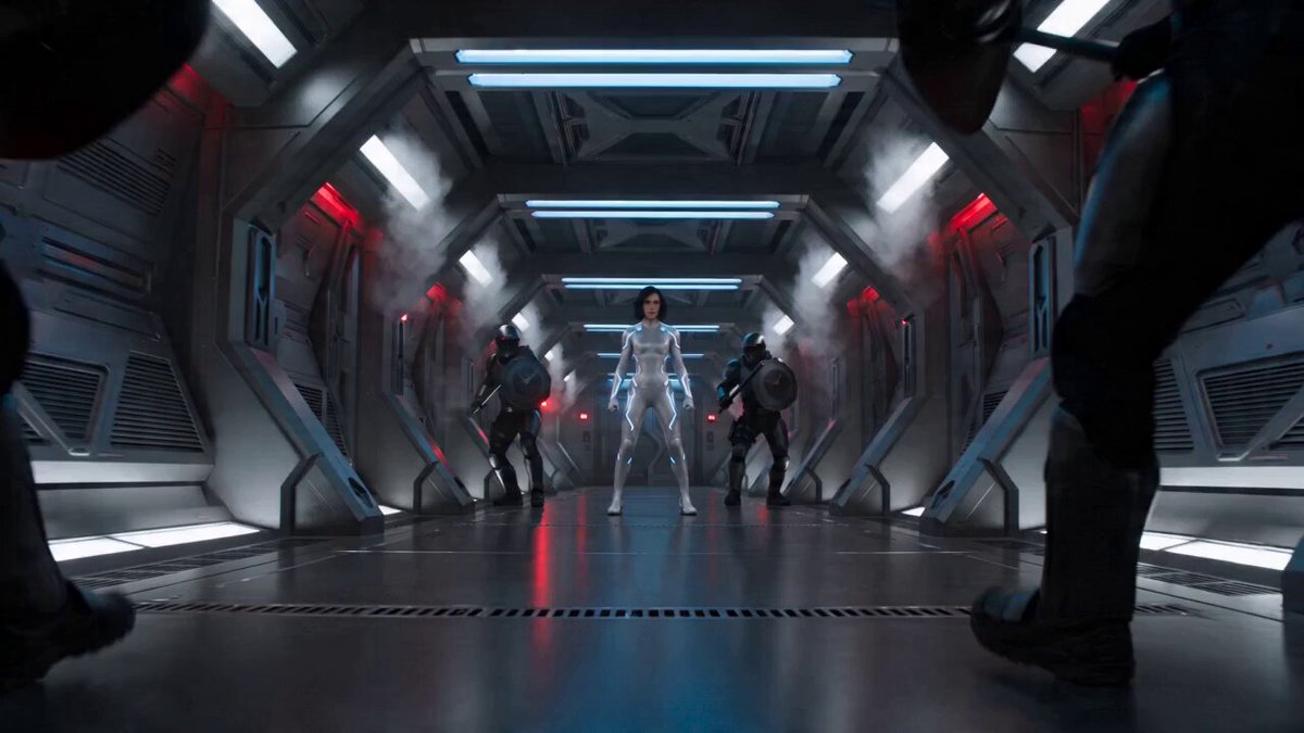 Sci-Fi Action: Woman in Adaptive Suit vs Tactical Enforcers