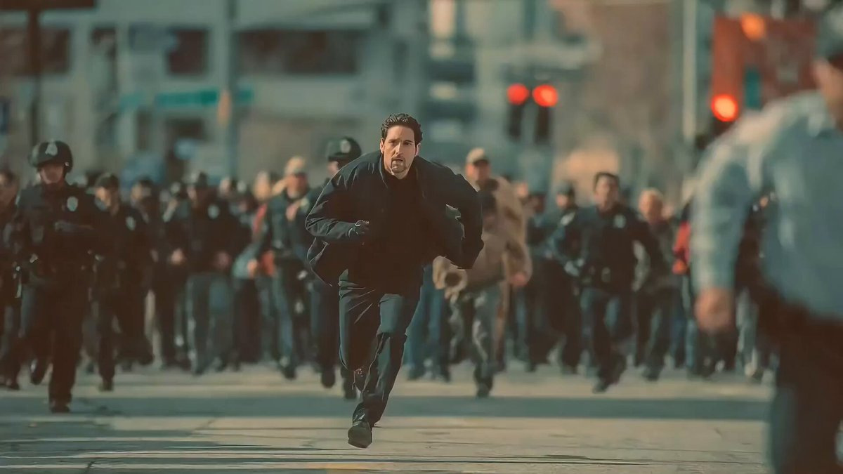 Man Fleeing Police in Urban Chase