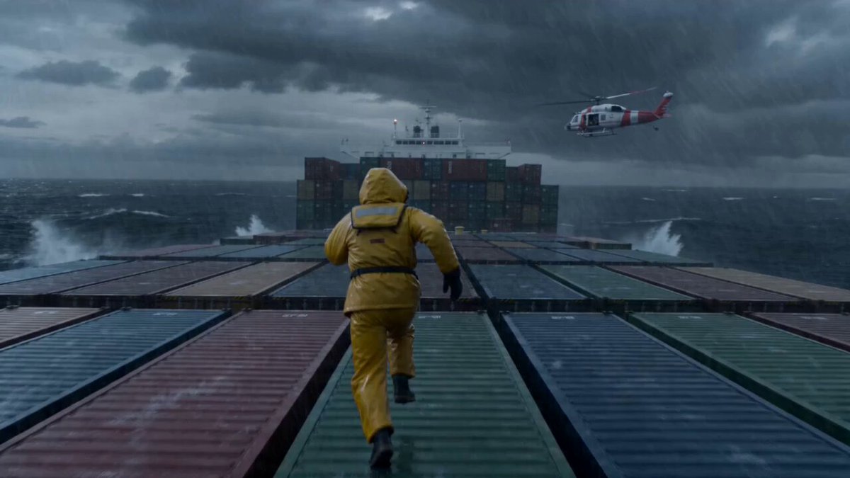 Man in Survival Suit Escapes Stormy Cargo Ship to Helicopter