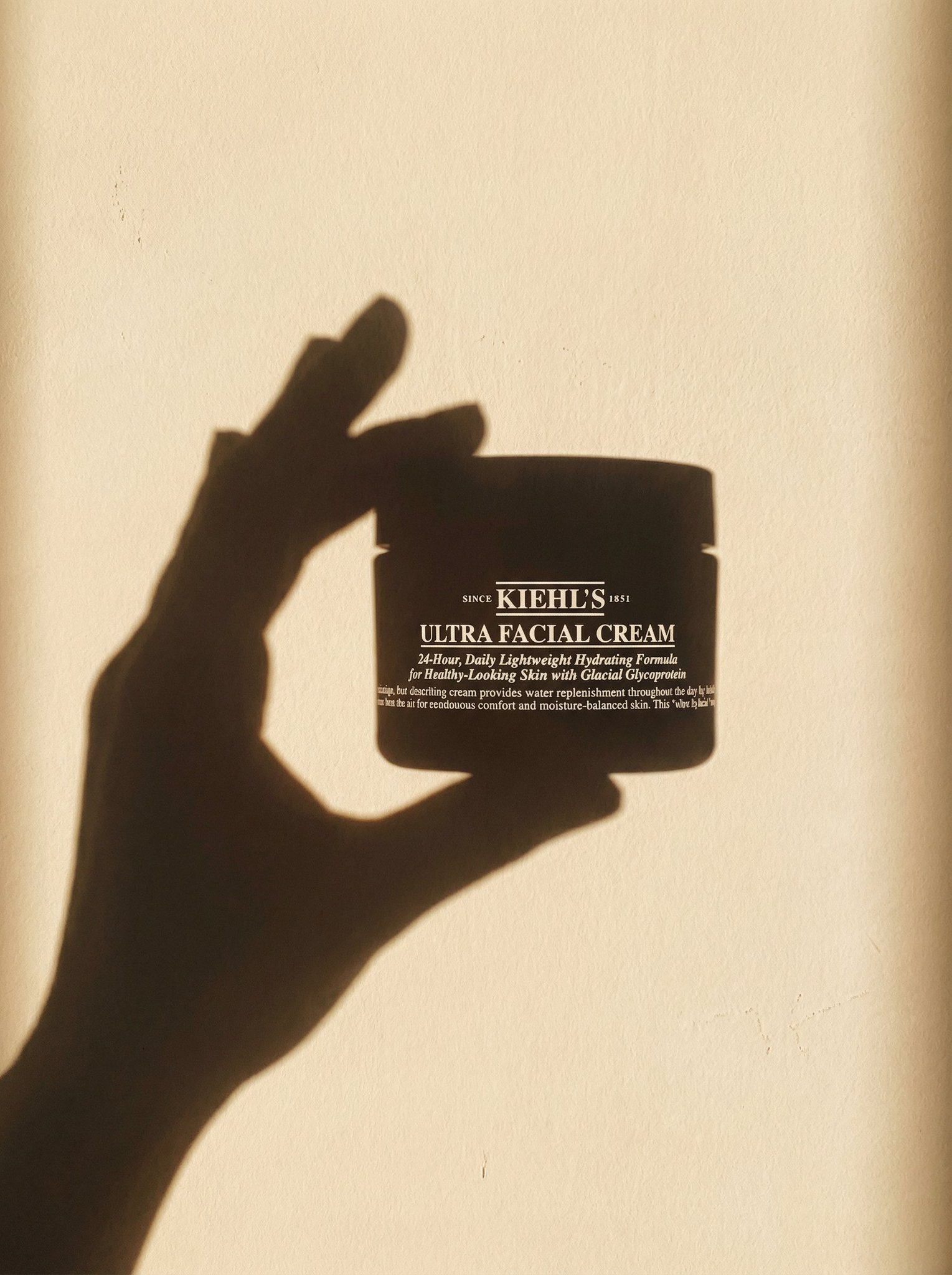 Minimal Sunlit Wall with Product Shadow Typography