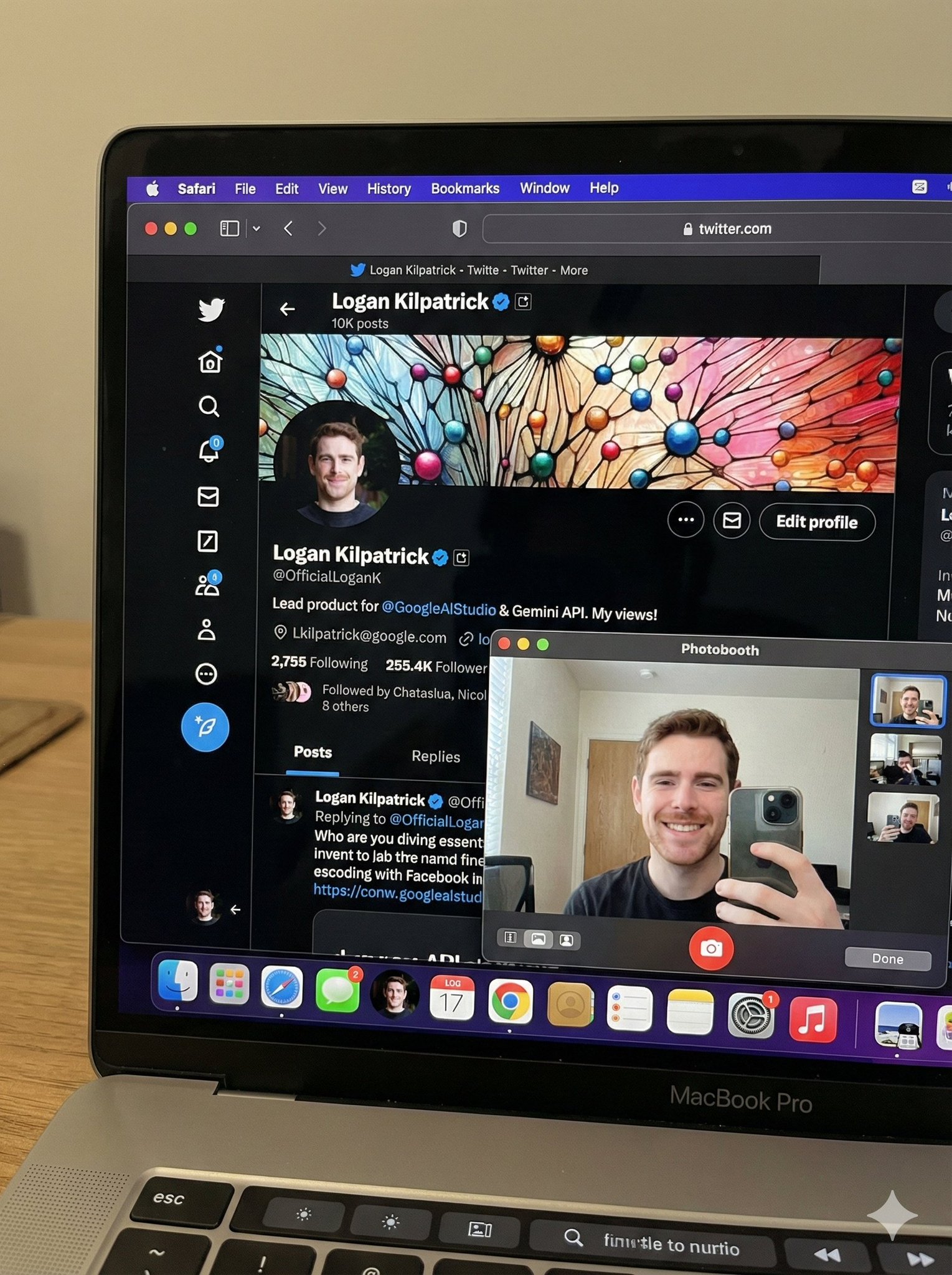 MacBook Pro with X App and Photo Booth Selfie